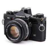 Olympus OM-2 + 50mm f1.8 F.Zuiko Auto-S - Cámara Vintage SLR de 35mm de segunda mano en Camera Market